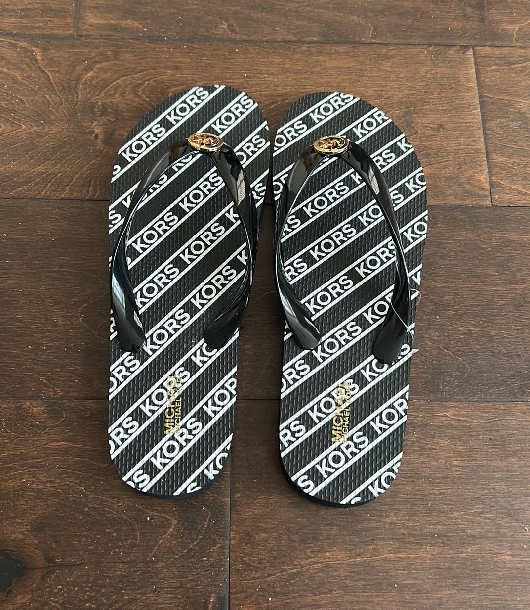 Michael Kors Womens Flip Flops Sz 8 Gold MK Logo Black White